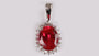 A Ruby & White Cubic Zirconia Pendant.