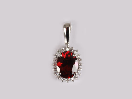A Garnet & White Cubic Zirconia Pendant.