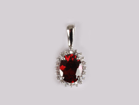 A Garnet & White Cubic Zirconia Pendant.