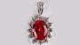 A Ruby & White Cubic Zirconia Pendant.