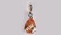A Champagne/Smokey Quartz & White Cubic Zirconia Pendant.