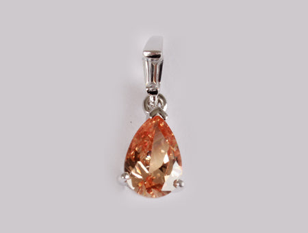 A Champagne/Smokey Quartz & White Cubic Zirconia Pendant.