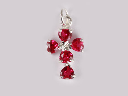 A Ruby & White Cubic Zirconia Pendant.