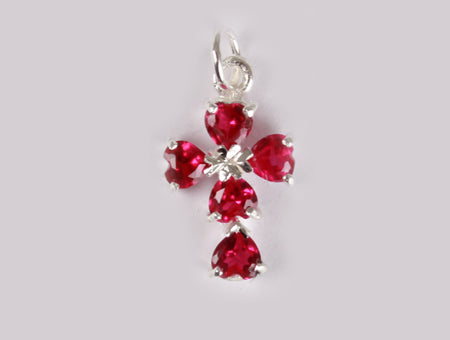 A Ruby & White Cubic Zirconia Pendant.