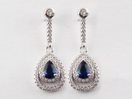 A Sapphire & White Cubic Zirconia Earring.