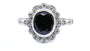A Black and White Cubic Zirconia Ring.