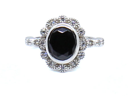 A Black and White Cubic Zirconia Ring.