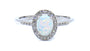 A Opal And White Cubic Zirconia Ring