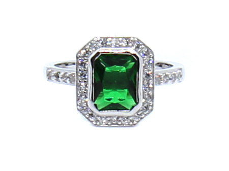 A Emerald and White Cubic Zirconia Ring