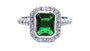 A Emerald and White Cubic Zirconia Ring