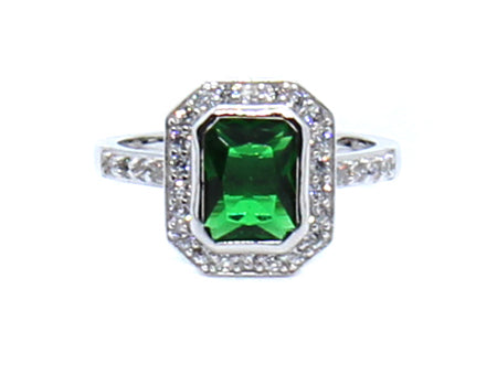 A Emerald and White Cubic Zirconia Ring