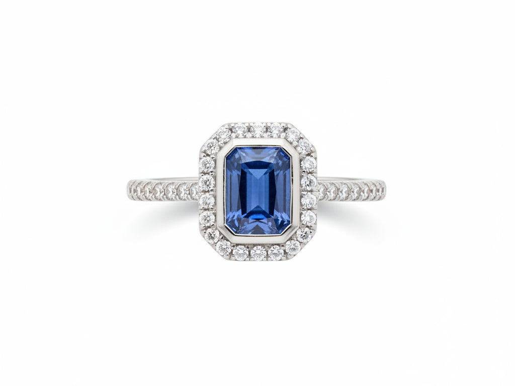 A Sapphire and White Cubic Zirconia Ring