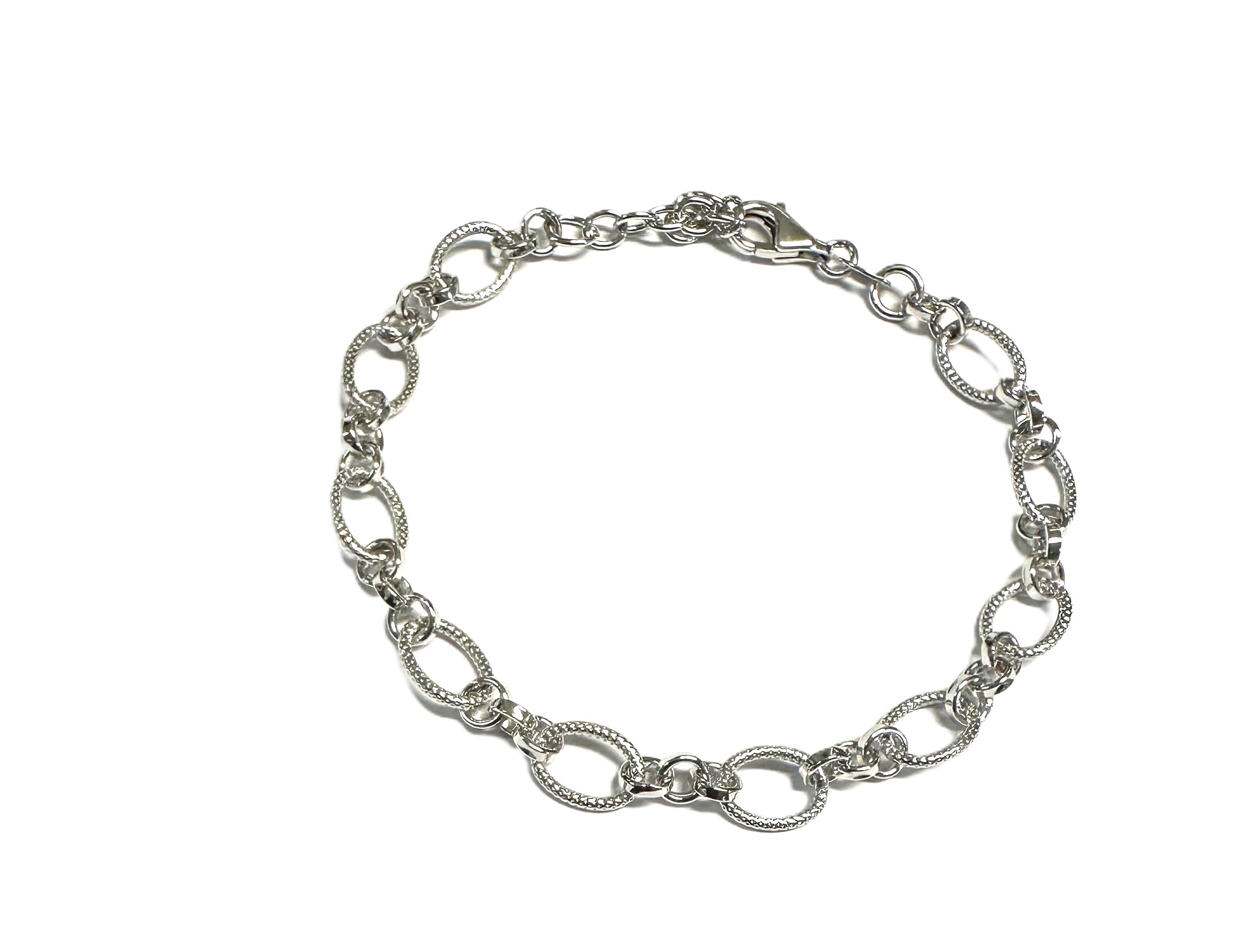 A Silver Necklace and Bracelet