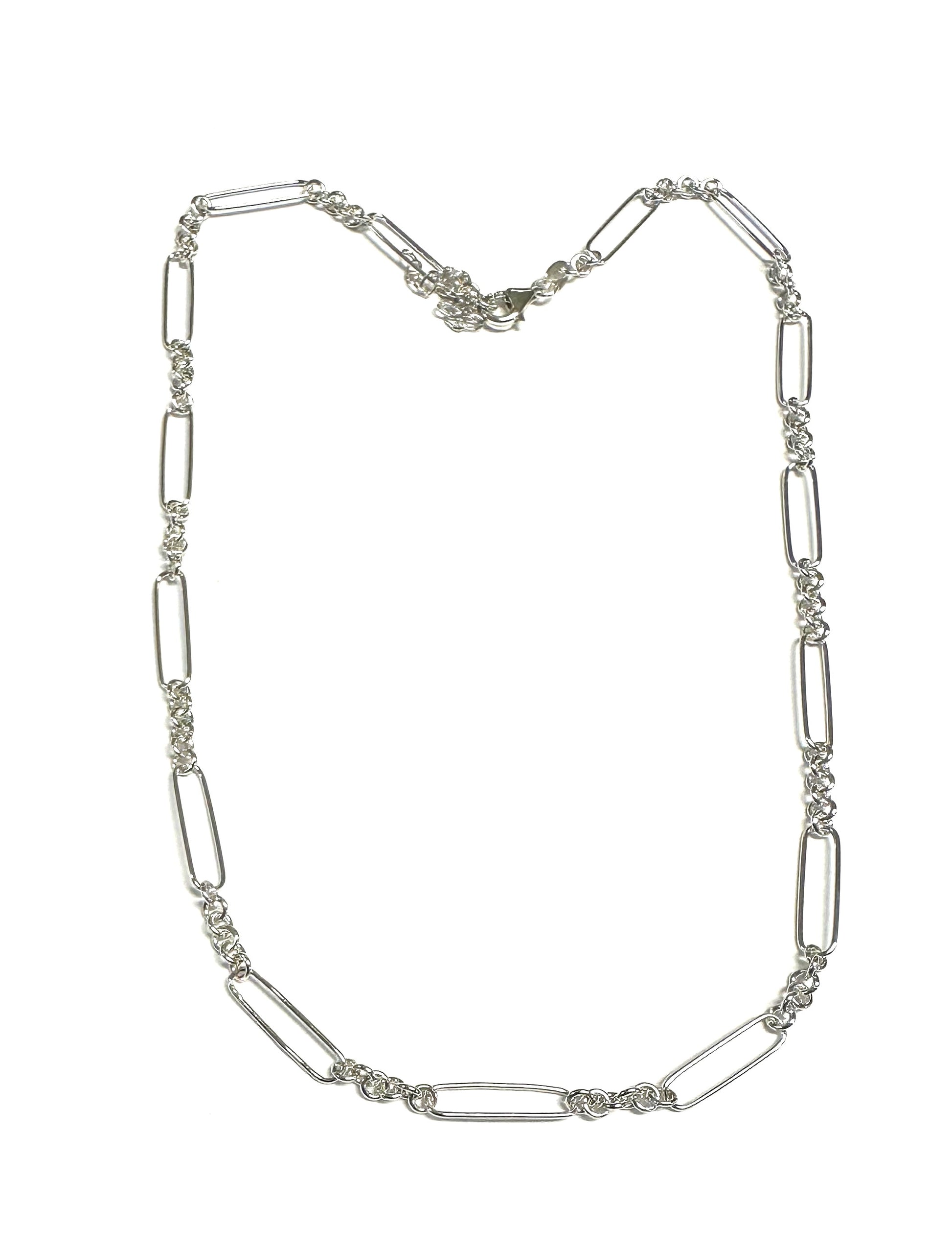 A Silver Necklace and Bracelet