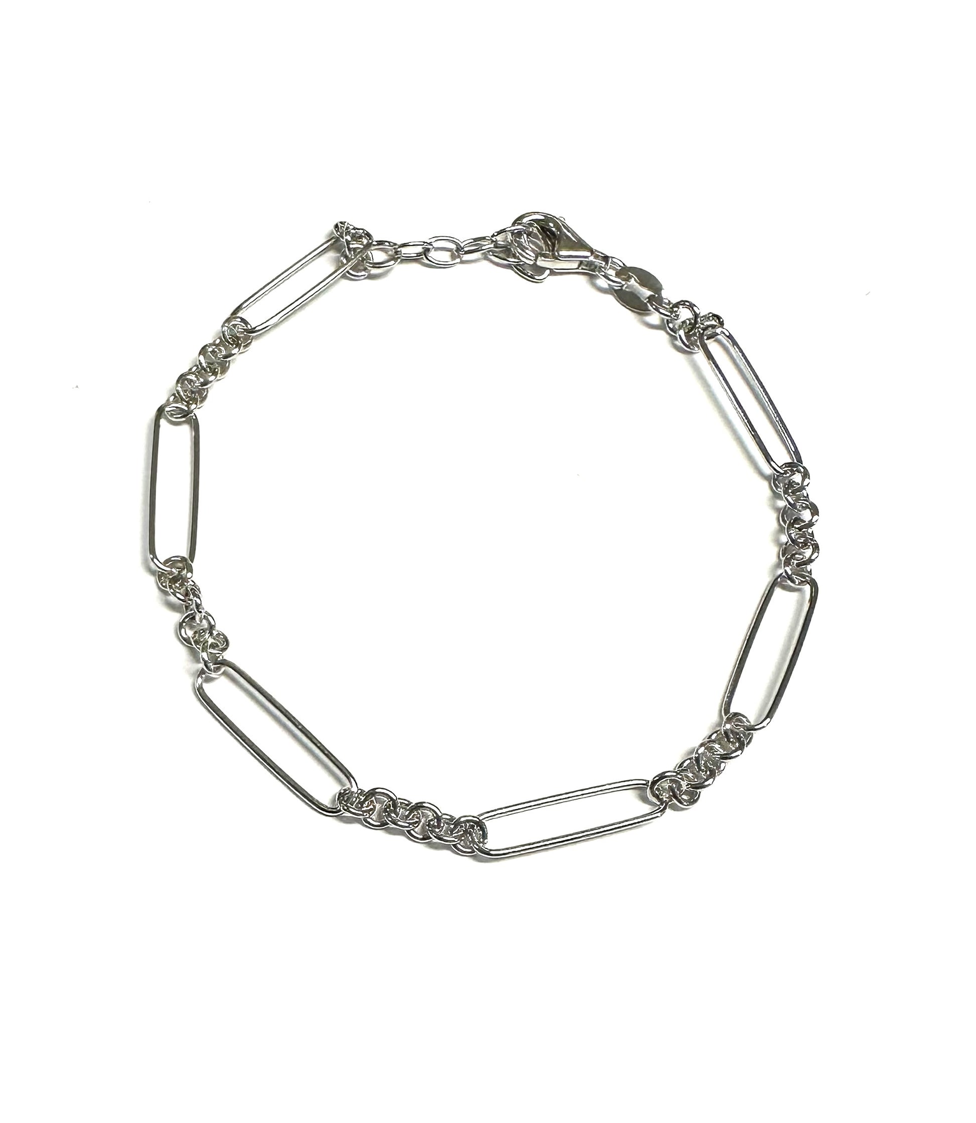 A Silver Necklace and Bracelet