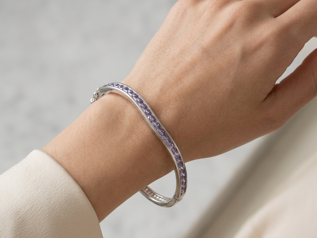Amethyst Cubic Zirconia Silver Twist Design Bangle.