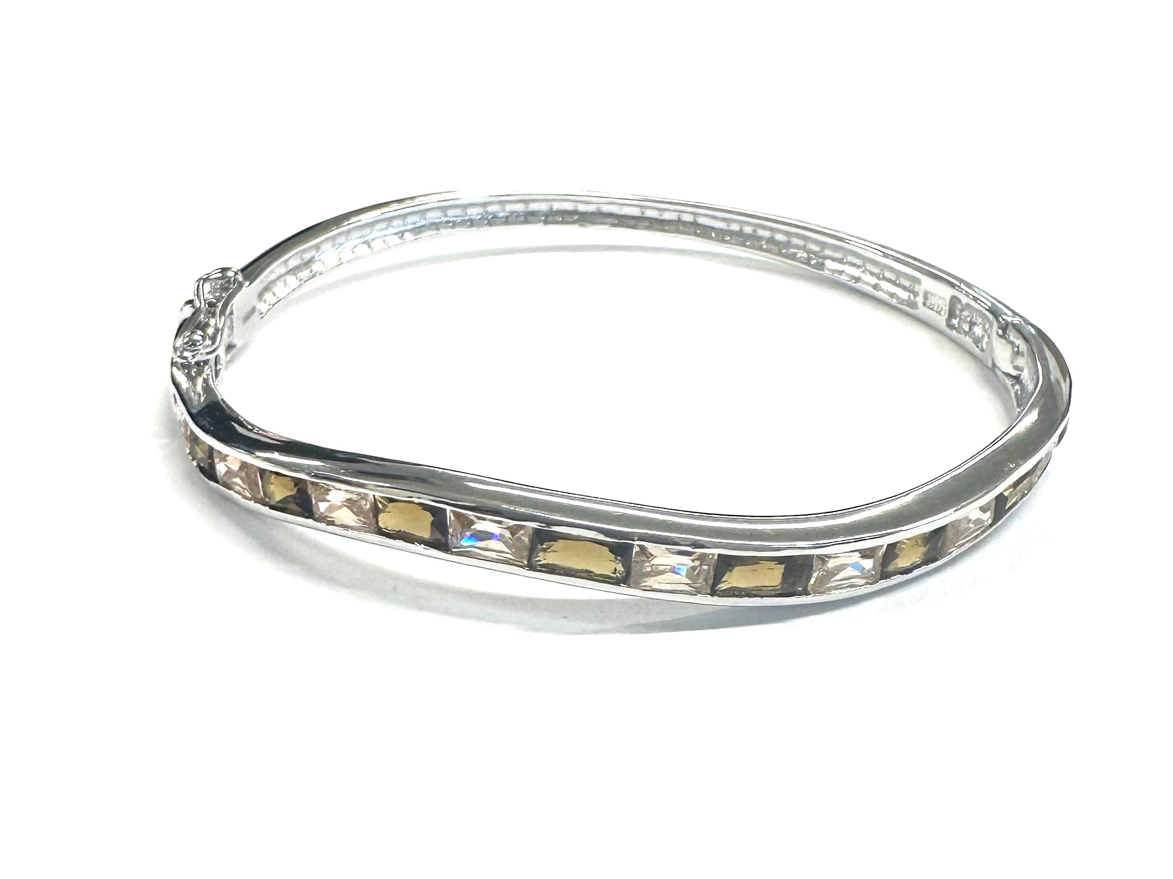 Champagne And Smokey Quartz Cubic Zirconia Silver Twist Design Bangle.