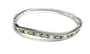Champagne And Smokey Quartz Cubic Zirconia Silver Twist Design Bangle.