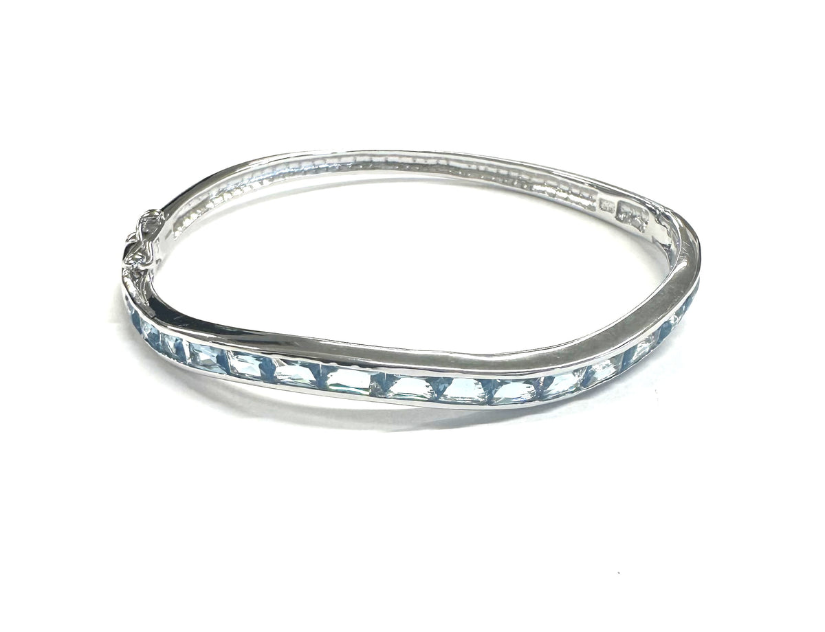 Aquamarine Cubic Zirconia Silver Twist Design Bangle.