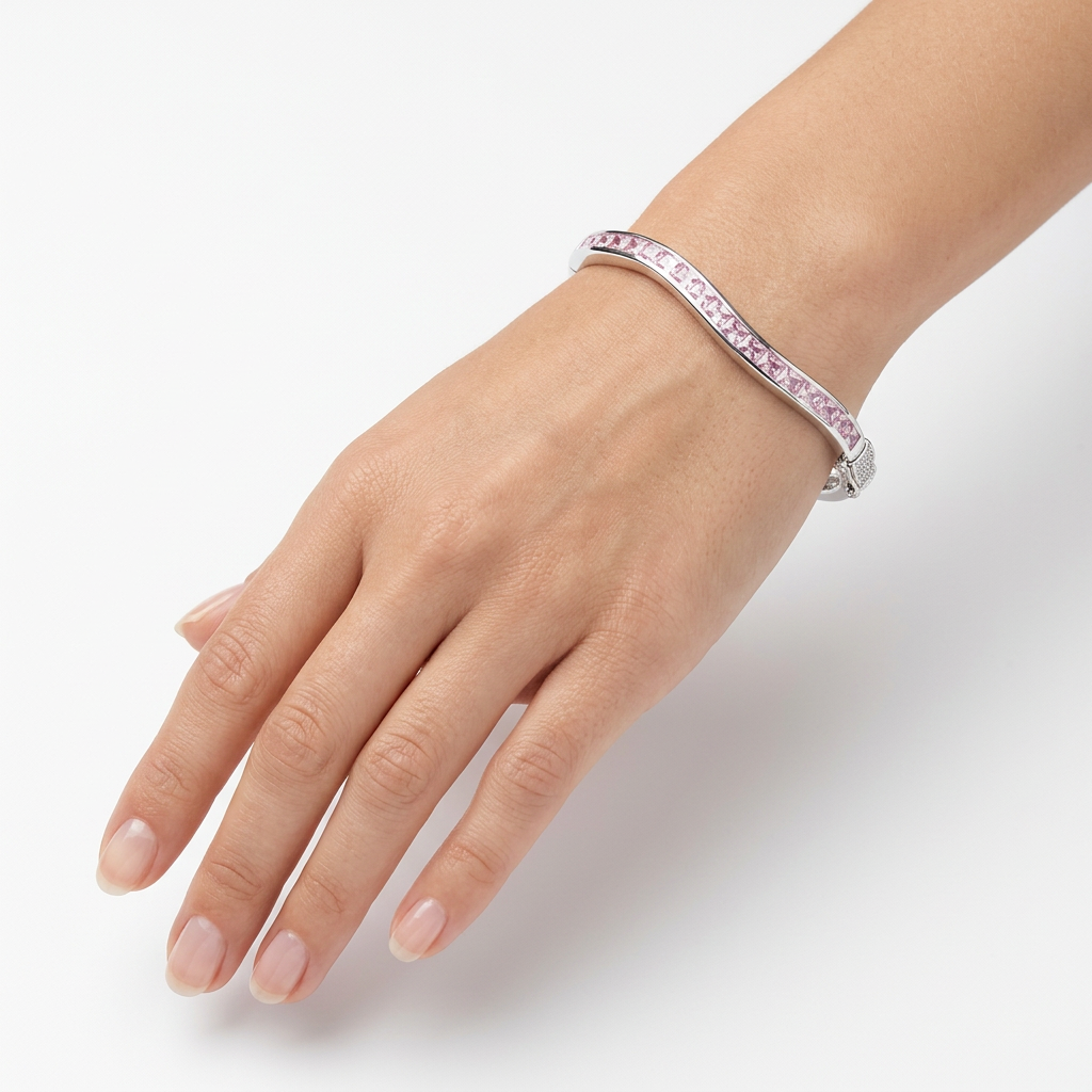 Pink Cubic Zirconia Silver Twist Design Bangle.