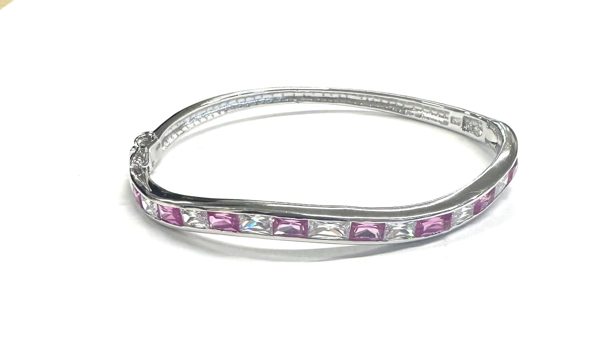 Ruby And White Cubic Zirconia Silver Twist Design Bangle.