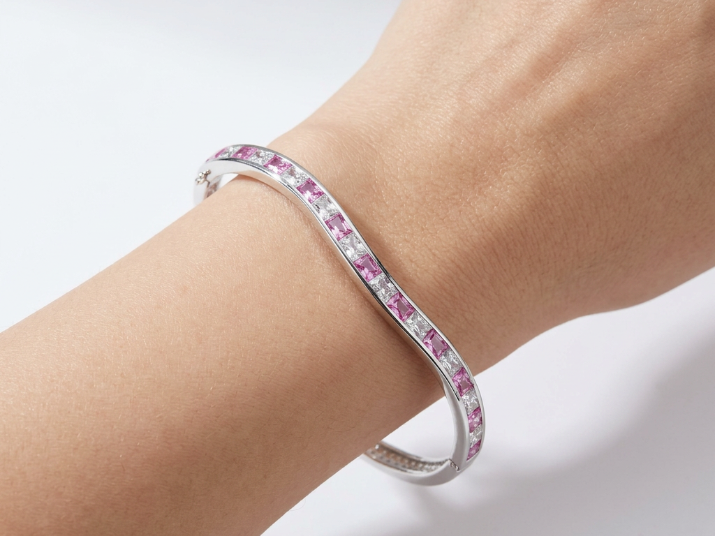 Ruby And White Cubic Zirconia Silver Twist Design Bangle.