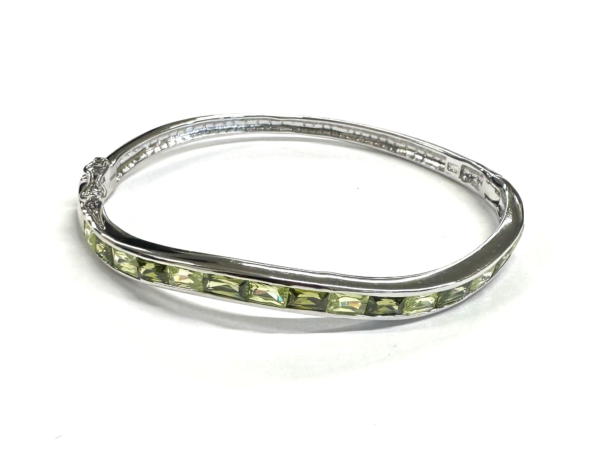 Peridot Dark And Light Cubic Zirconia Silver Twist Design Bangle.