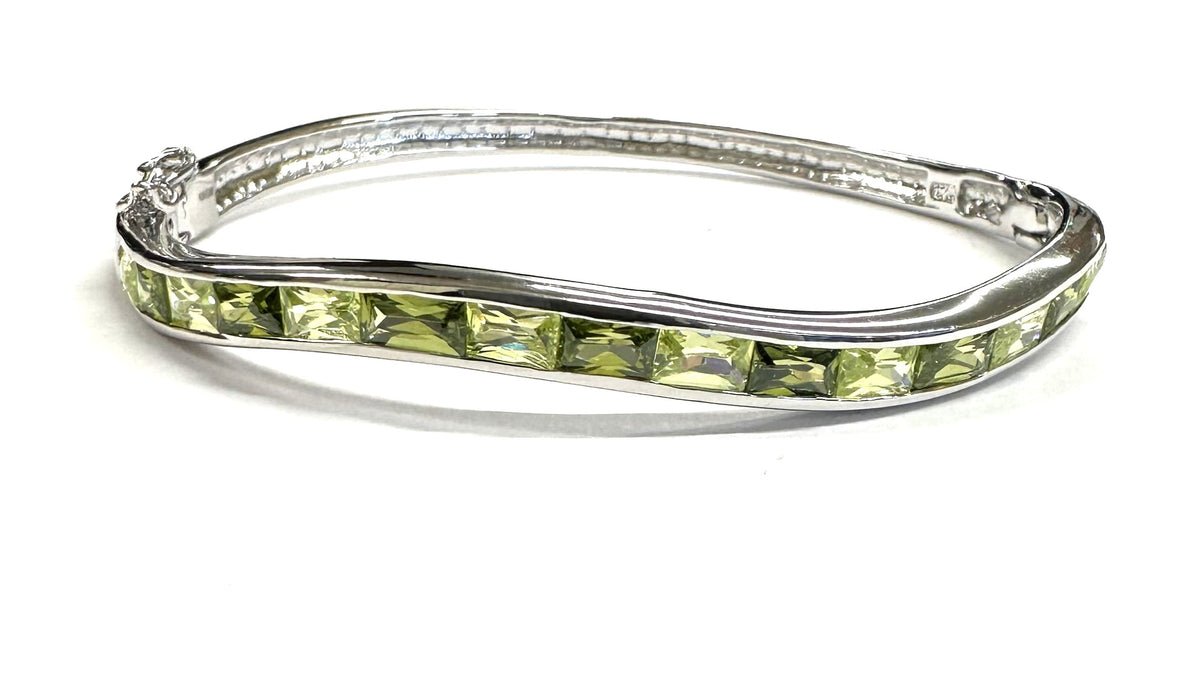 Peridot Dark And Light Cubic Zirconia Silver Twist Design Bangle.