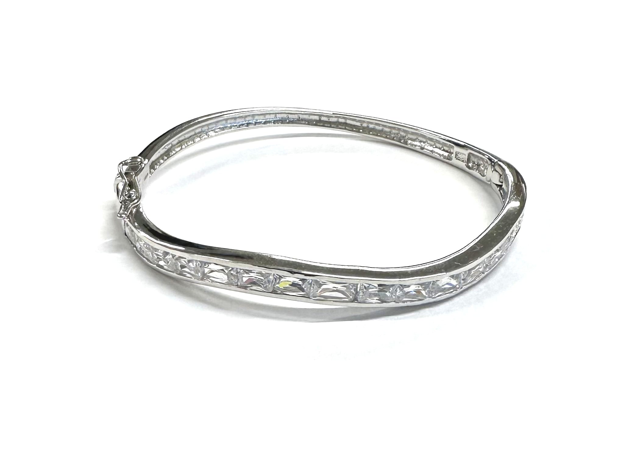 White Cubic Zirconia Silver Twist Design Bangle.