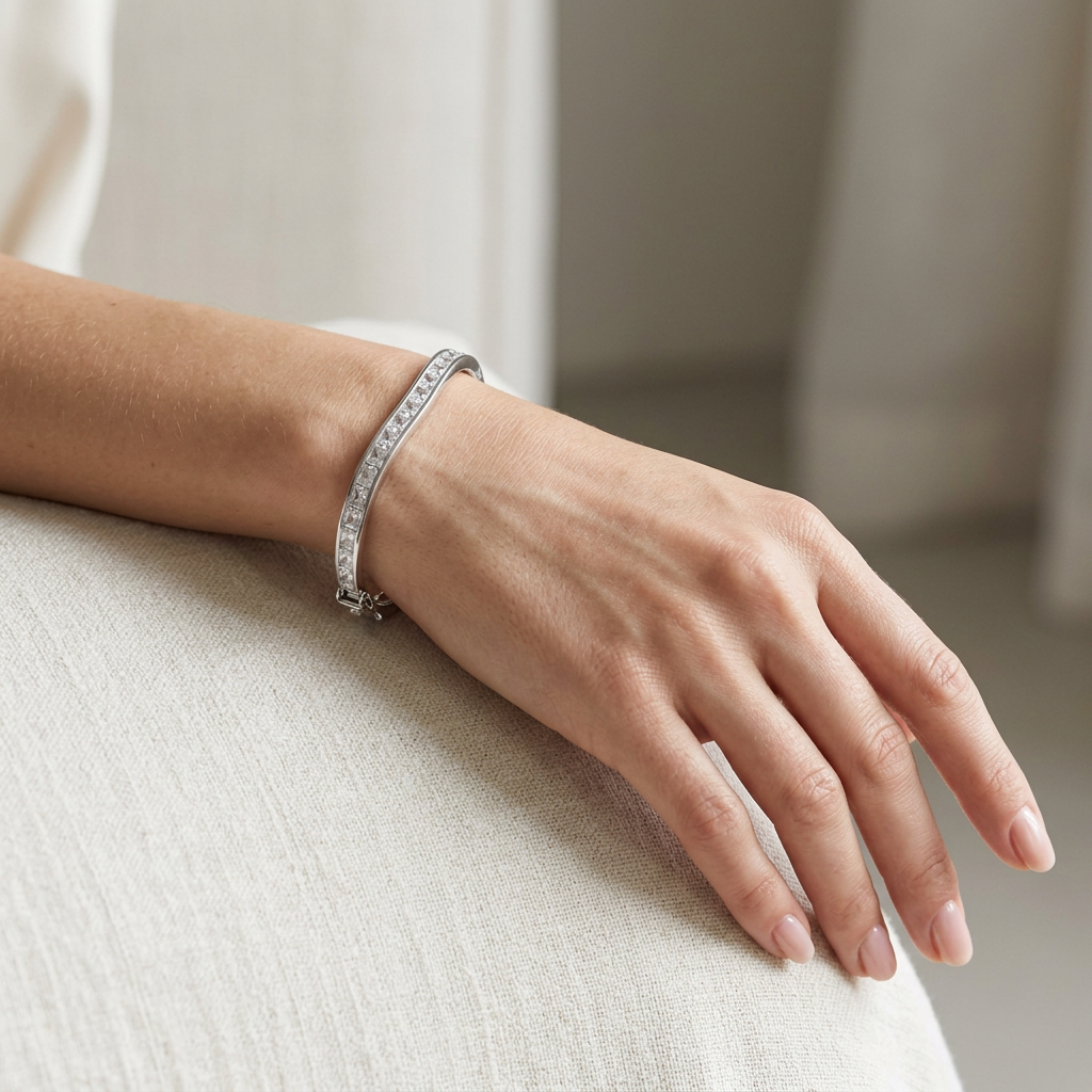 White Cubic Zirconia Silver Twist Design Bangle.