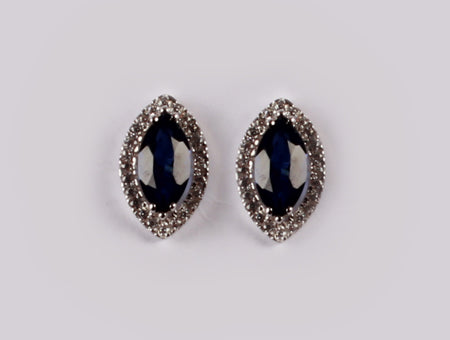 9 CT White Gold Earring.