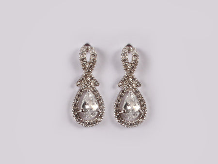 9 CT White Gold Earring.