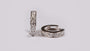 9 CT White Gold Earring.
