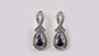9 CT White Gold Earring.