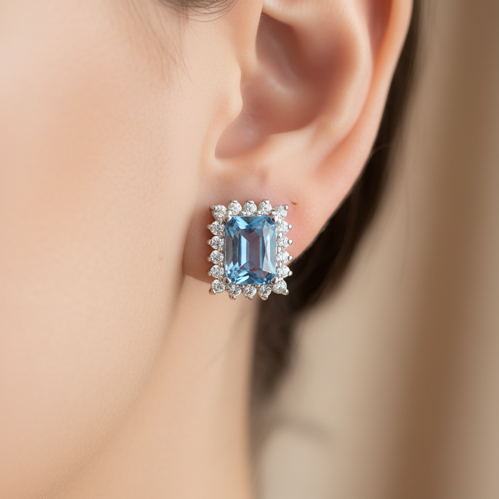 An Aquamarine & White Cubic Zirconia Earring.