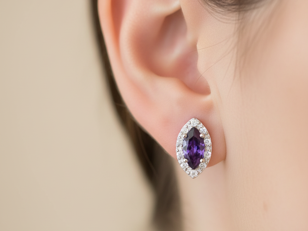An Amethyst & White Cubic Zirconia Earring.
