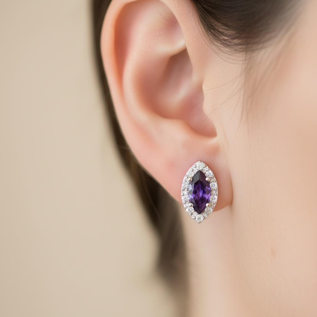 An Amethyst & White Cubic Zirconia Earring.