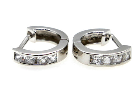 A White Cubic Zirconia Earring.