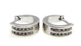 A White Cubic Zirconia Earring.
