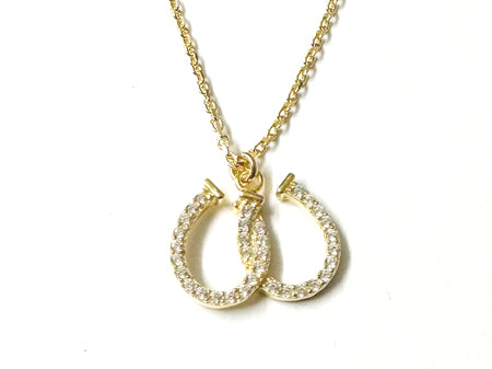 A White CZ Yellow Plated Horseshoe Necklace