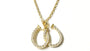 A White CZ Yellow Plated Horseshoe Necklace