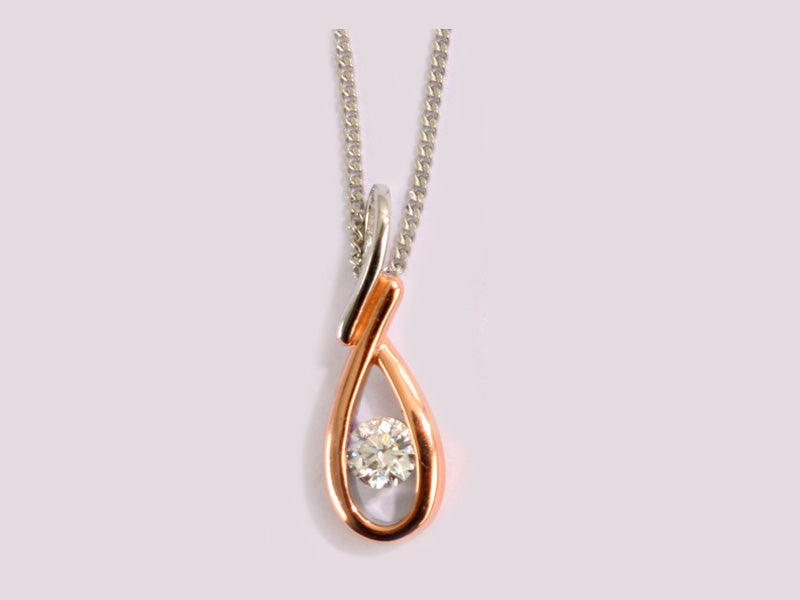 A Silver with Rose Gold Plate Pendant