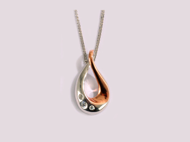 A Silver with Rose Gold Plate Pendant