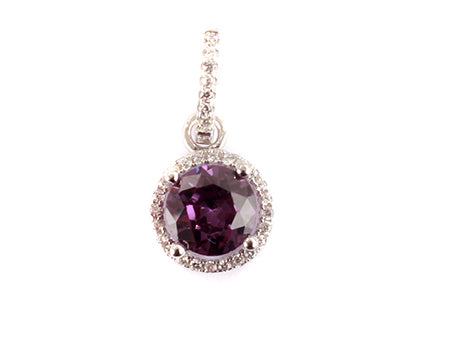 A Amethyst & White Cubic Zirconia Pendant.
