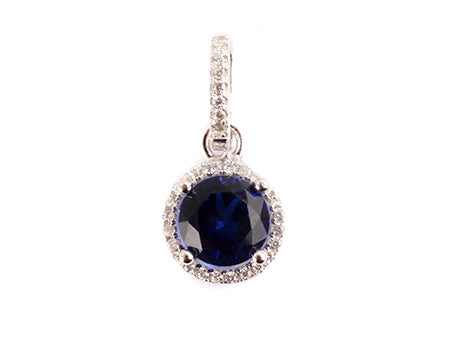 A Sapphire & White Cubic Zirconia Earring.