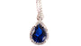 A Sapphire & White Cubic Zirconia Pendant.