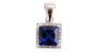 A Sapphire & White Cubic Zirconia Pendant.