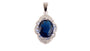 A Sapphire & White Cubic Zirconia Pendant.