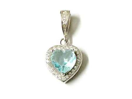 A Aquamarine & White Cubic Zirconia Heart Pendant.