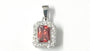 A Garnet & White Cubic Zirconia Pendant.